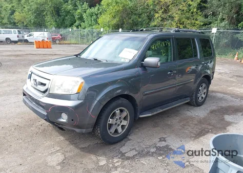 2010 Honda Pilot Touring z USA, uszkodzony, nr VIN 5FNYF4H93AB040958